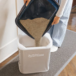 Siftease sifting cat litter box cleaning works with any clumping litter, shown efficiently pouring clay litter into the sifting litter tray